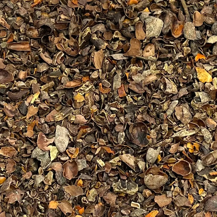 Close up of lose Cocoa and chilli tisane showing ingredients