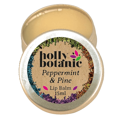 Peppermint and pine lip balm in 15ml tin, lid open.