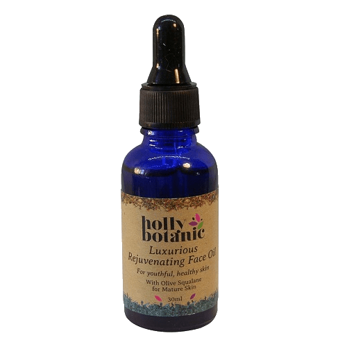 Rejuvenating face oil for mature skin in glass bottle with pipette.