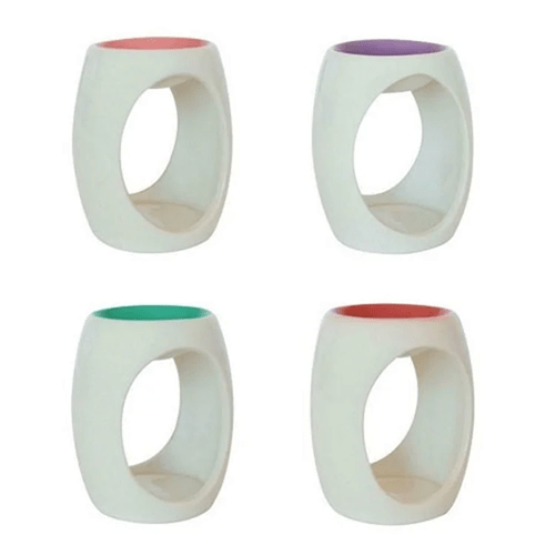 A ceramic oil burner for essential oils or wax melts in a choice of green, purple, red or pink. 