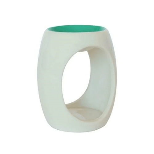 A ceramic oil burner with a green top.
