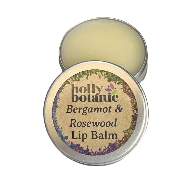a natural, handmade lip balm with rosewood and bergamot essential oils presented in a recyclable, aluminium tin.