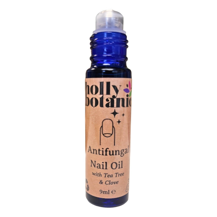 antifungal nail oil made with natural oils supplied in a glass rollerball bottle. Lid Off