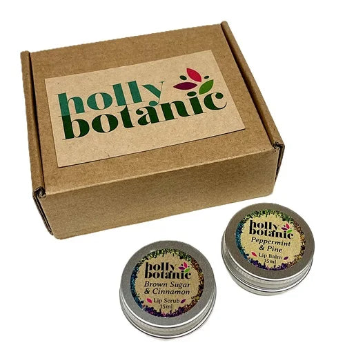 Lip love gift set contains your choice of handmade lip balm and lip scrub in a cardboard box.
