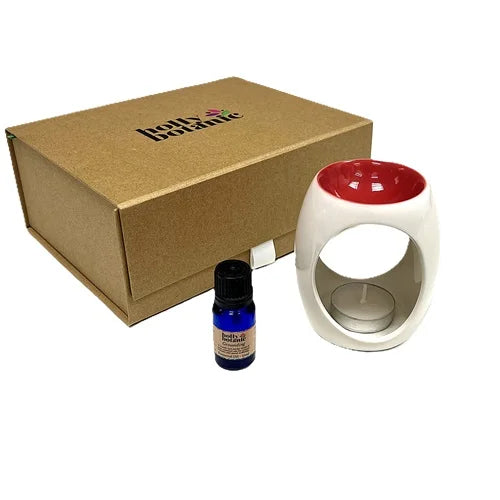 OIl and burner gift set includes your choice of essential oil blend (calming, comforting, defence, festive, grounding or uplifting) and your choice of ceramic oil burner (green, red, pink or purple) presented in a magnetic-close cardboard, reusable box.