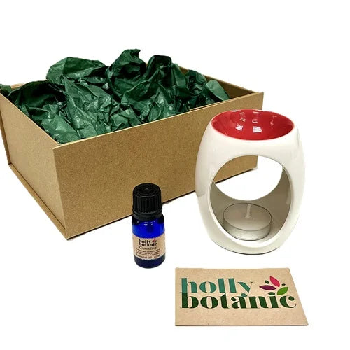 Essential oil and burner in a magnetic-close cardboard reusable box