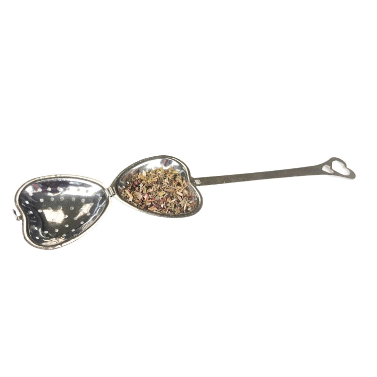 Stainless steel heart tea or tisane infuser designed for use with loose tea. Main image.Open with tea.