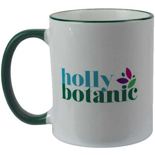 Holly Botanic mug with logo and motto and green handle and rim. 